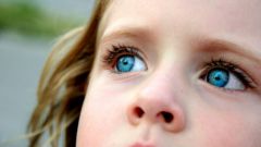What character at the person with blue eyes 